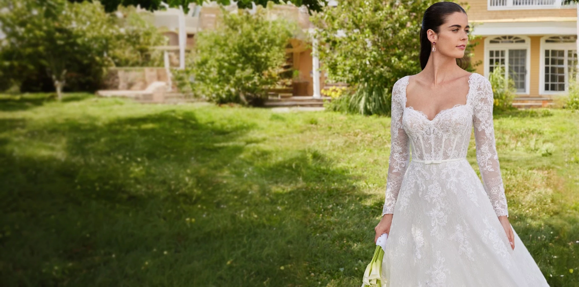 Model wearing white bridal gown