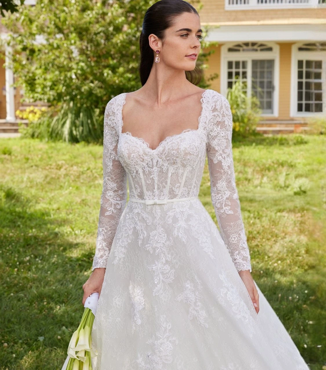 Model wearing white bridal gown - Mobile image