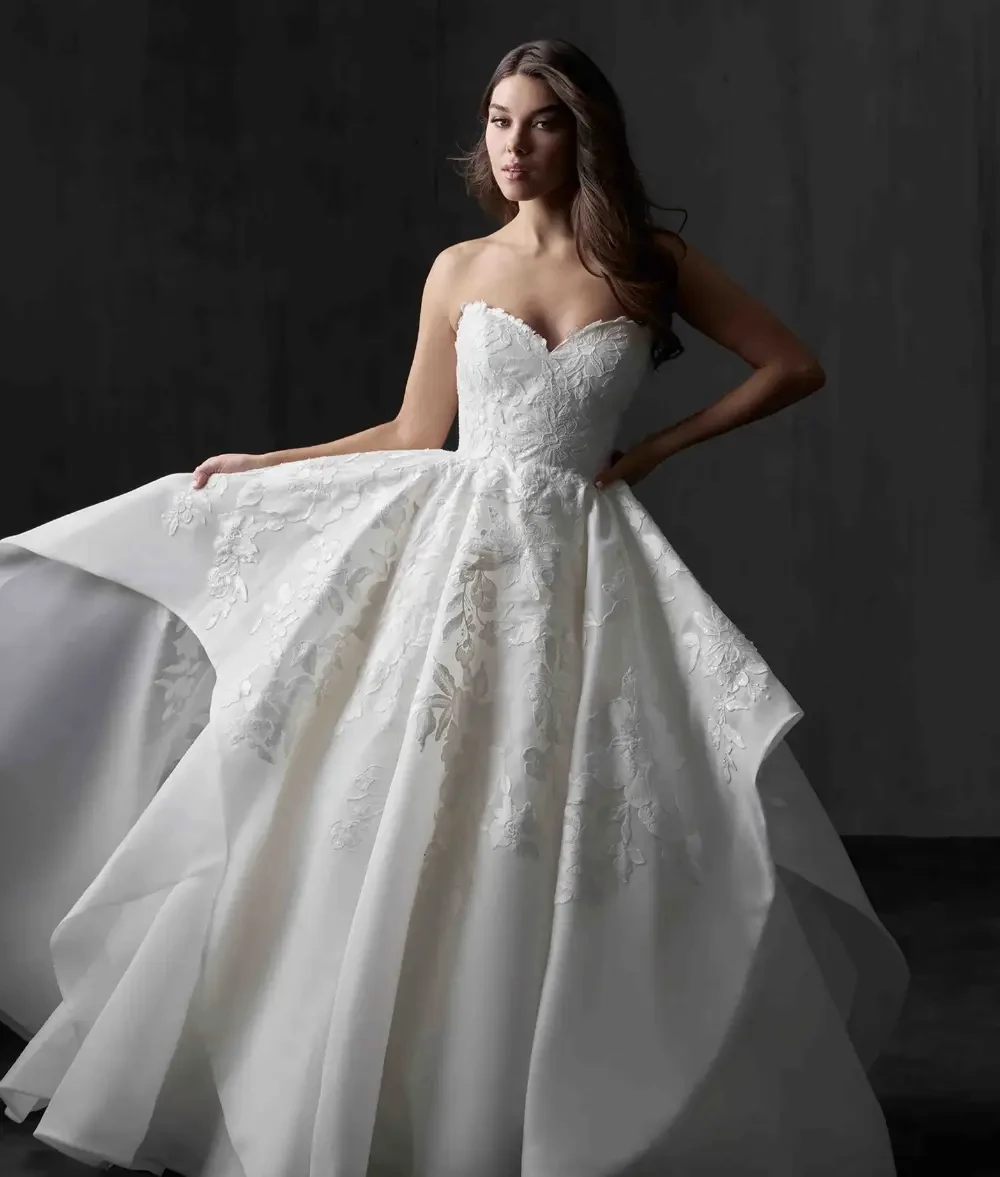 Model wearing a Allure Bridals dress