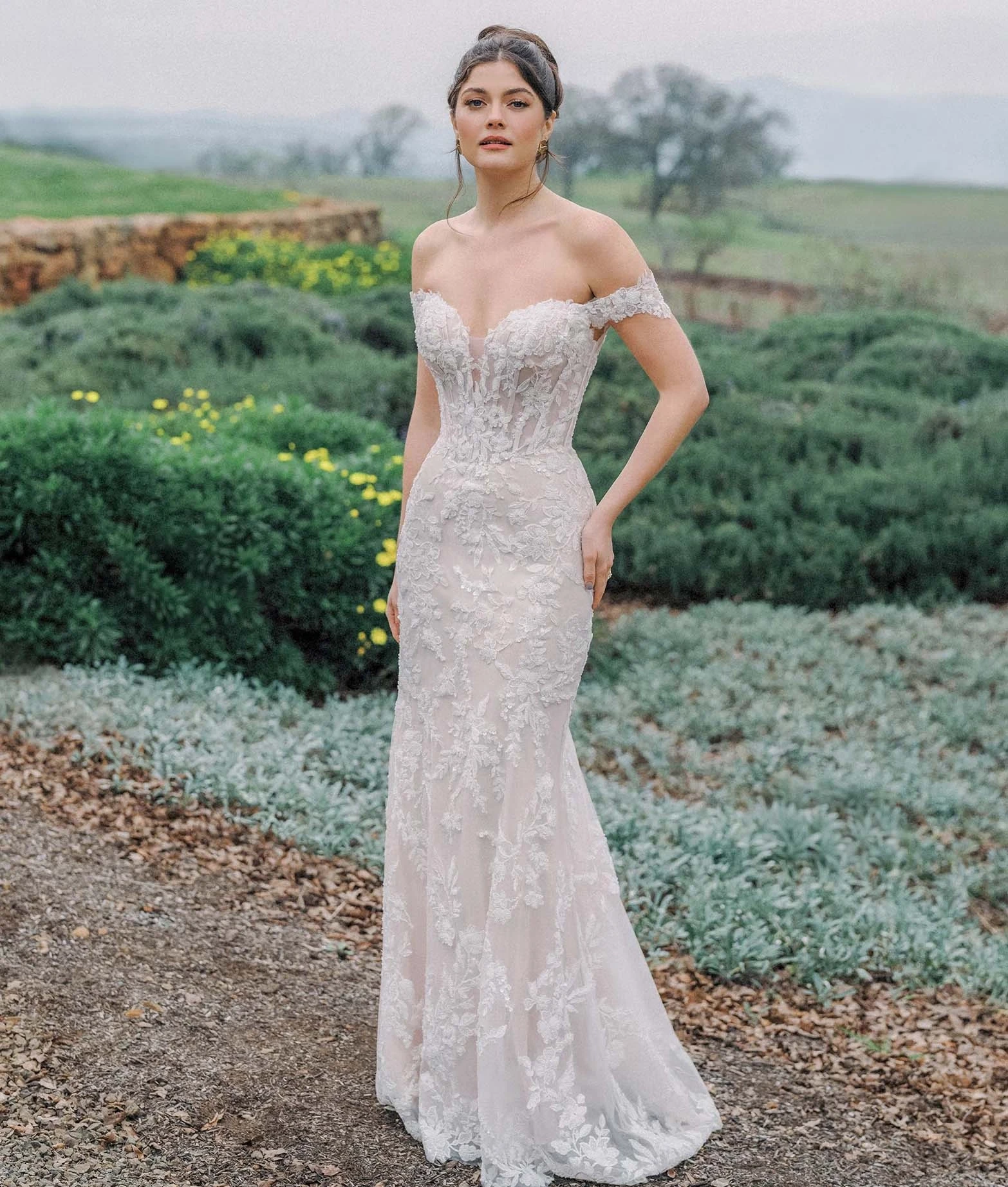 Model wearing a Allure Bridals dress