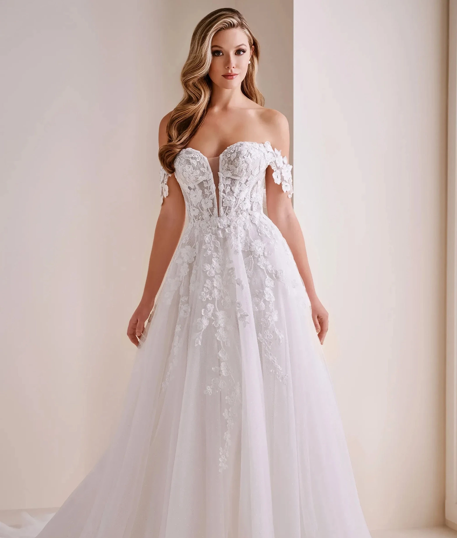 Model wearing a Mon Cheri wedding dress