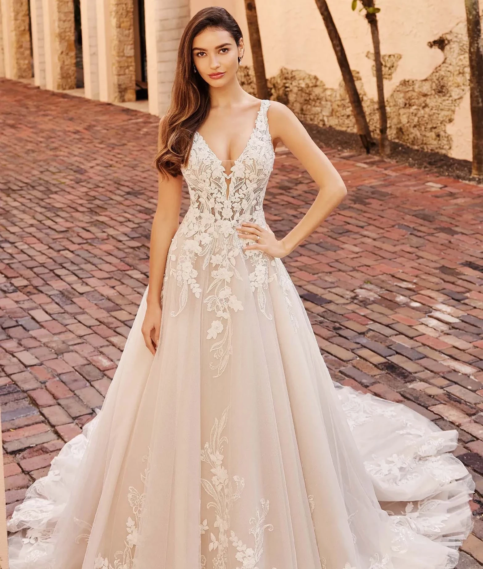 Model wearing a Mon Cheri wedding dress