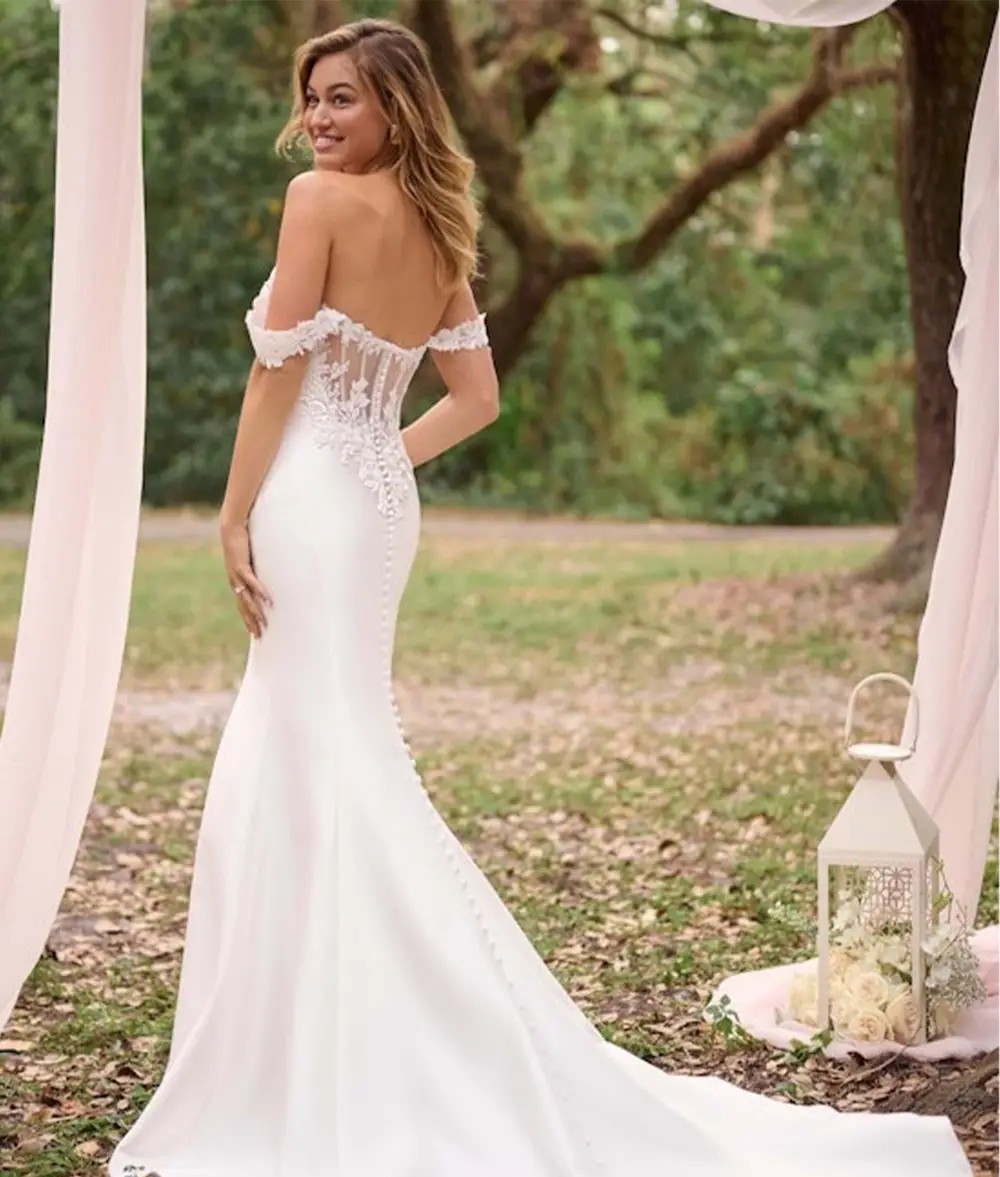 Model wearing a Rebecca Ingram wedding dress