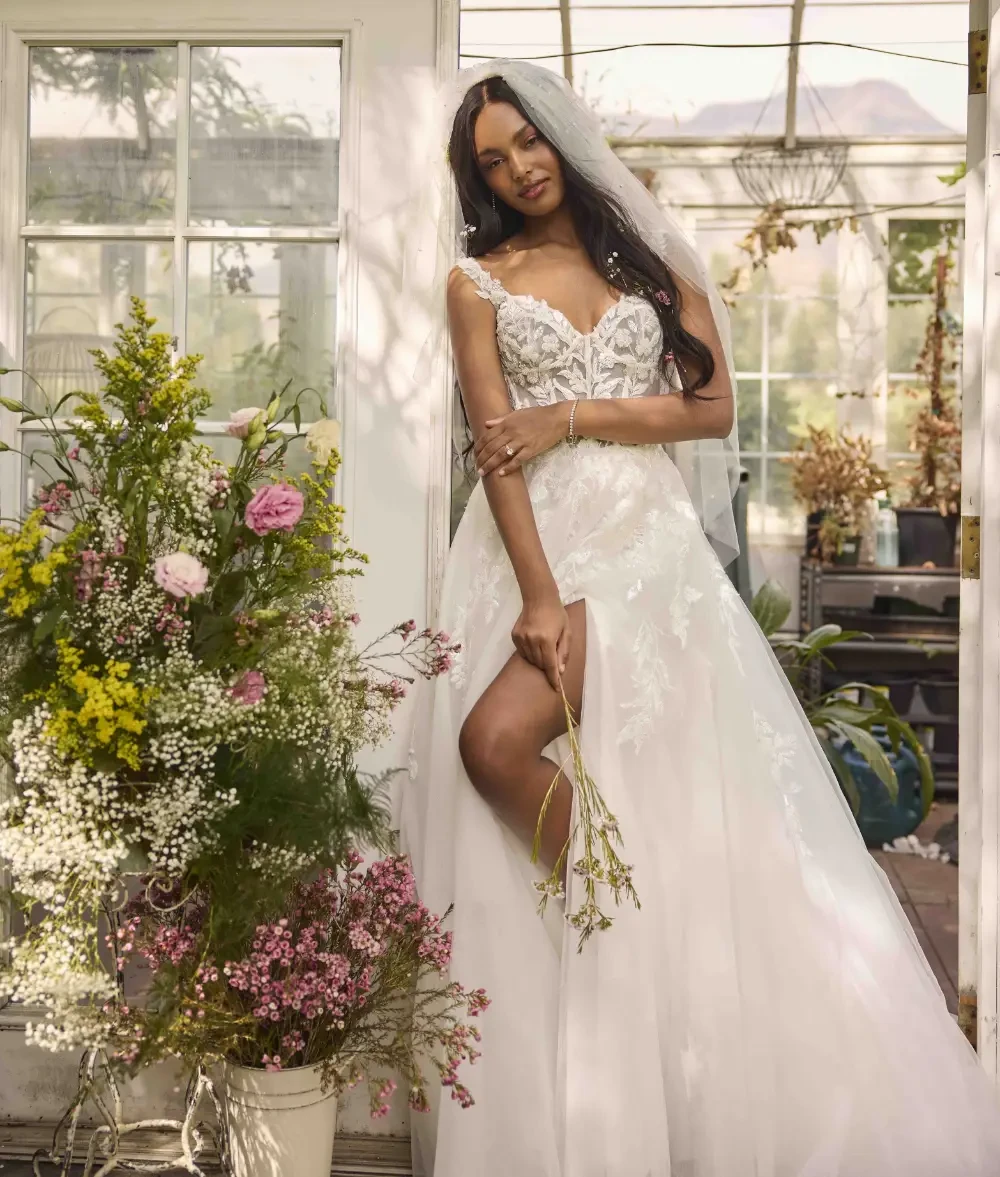 Model wearing a Rebecca Ingram wedding dress