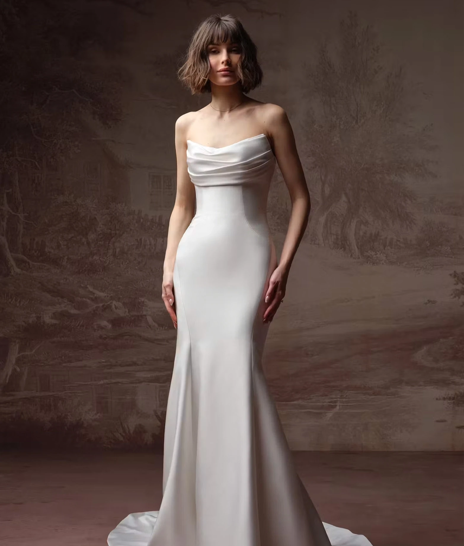 Model wearing a Rebecca Ingram wedding dress