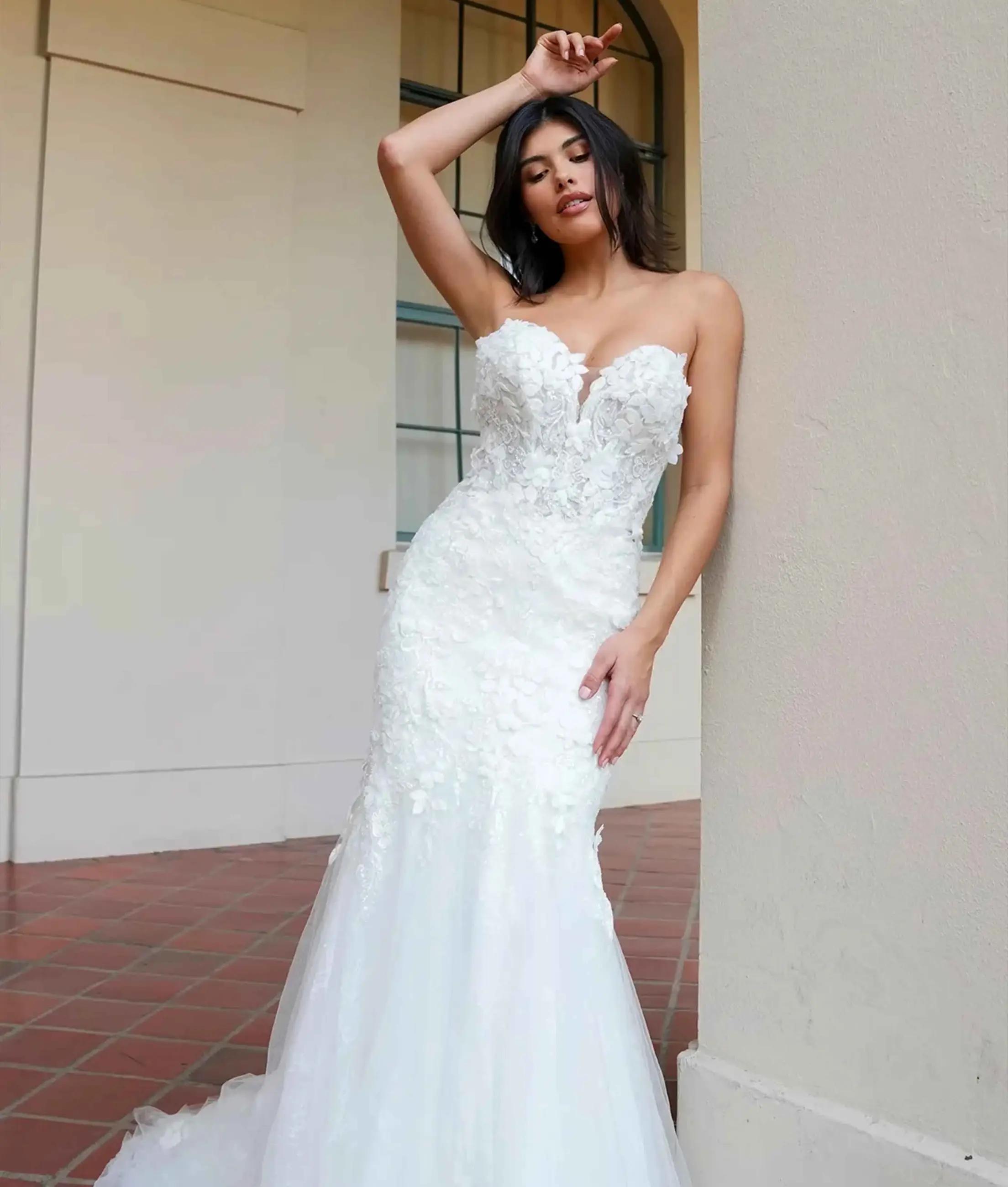 Model wearing a Stella York wedding dress