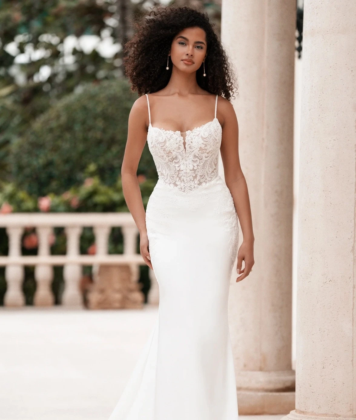 Model wearing a Allure Bridals dress