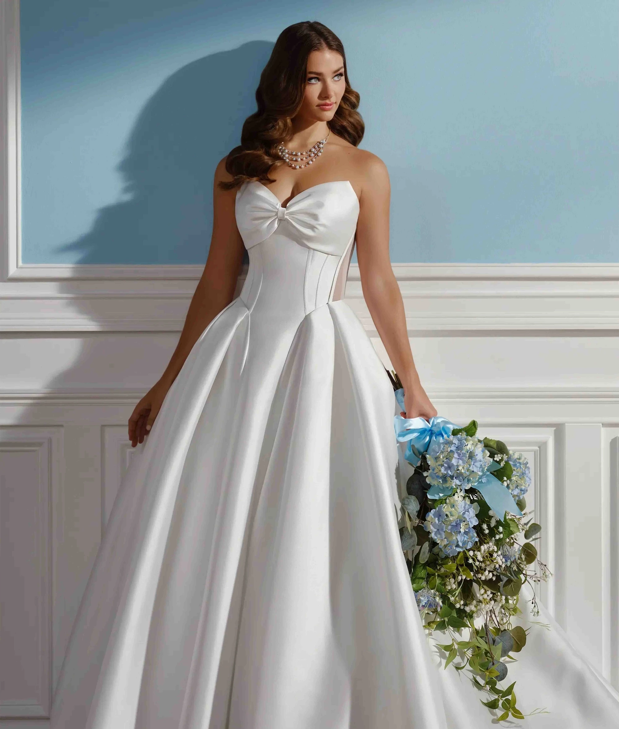 Model wearing a Mon Cheri wedding dress