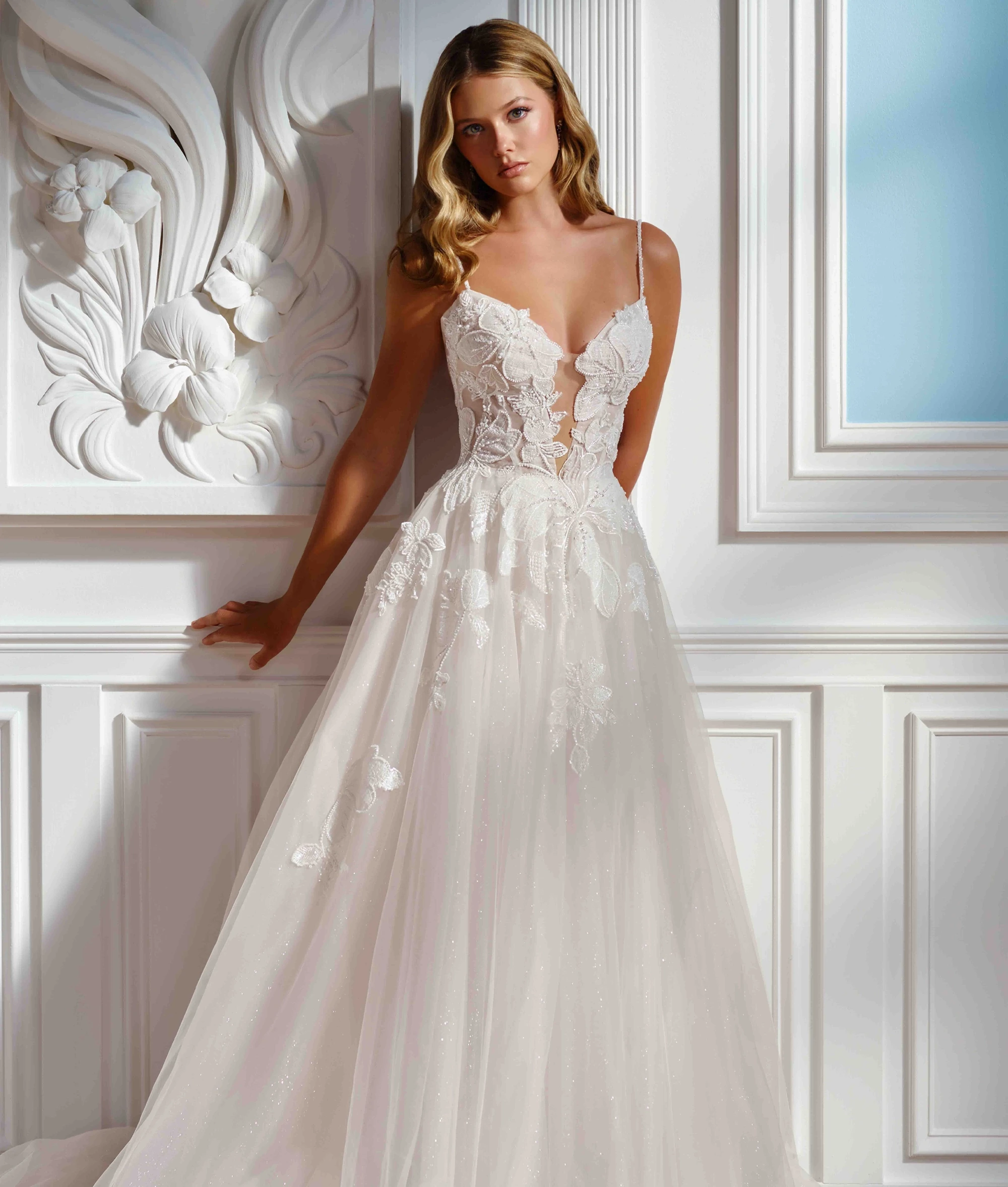 Model wearing a Mon Cheri wedding dress