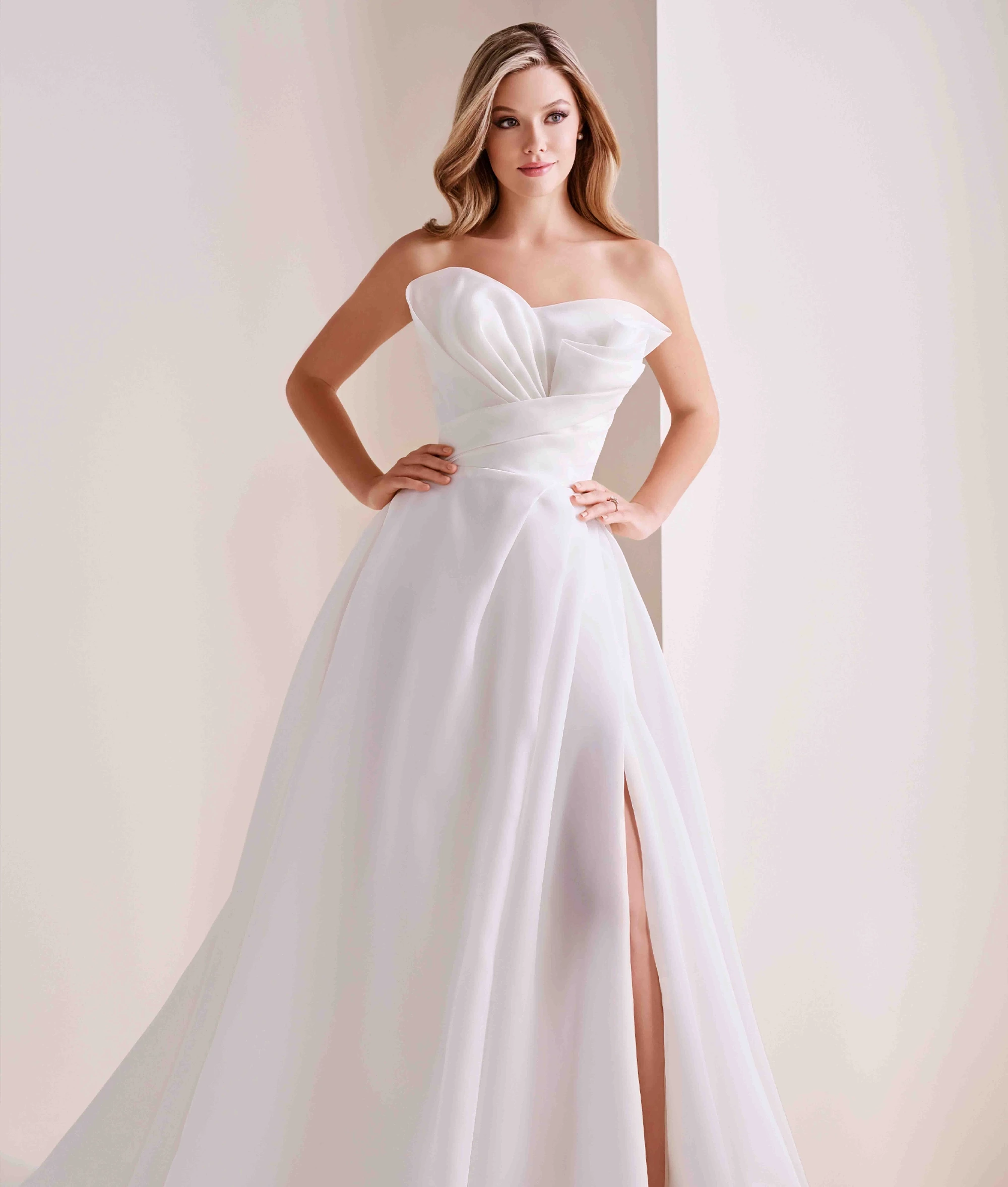 Model wearing a Mon Cheri wedding dress