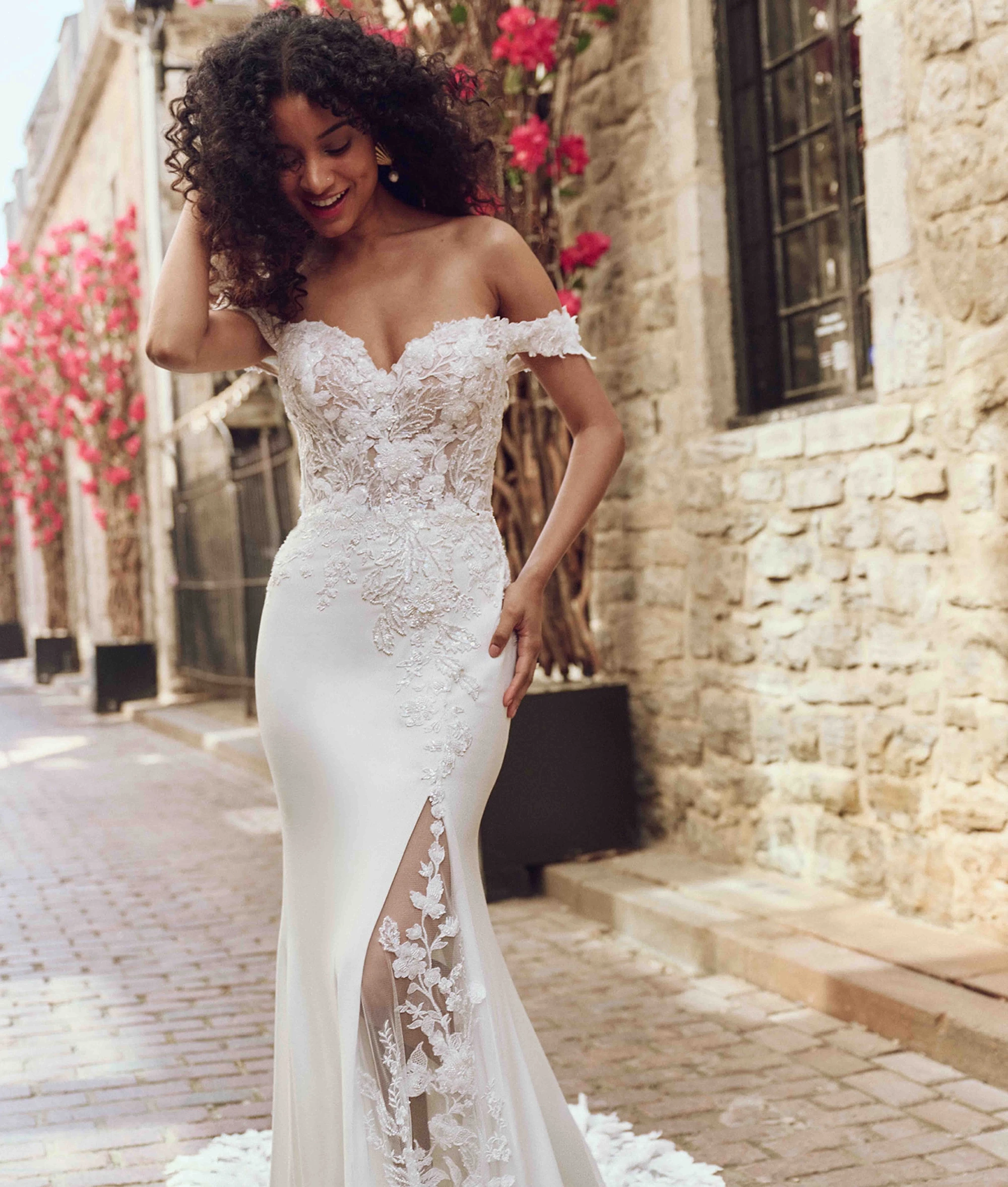 Model wearing a Rebecca Ingram wedding dress